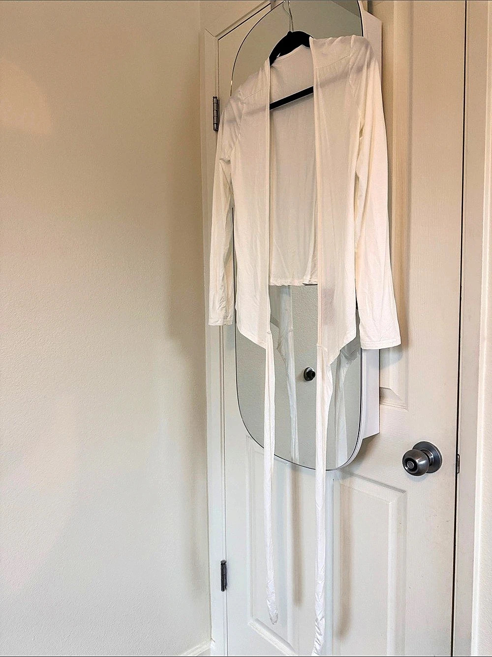 White long sleeve cardigan with tie detail